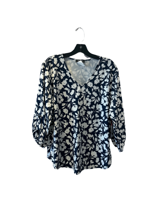 Deja Navy Vneck floral top with 3/4 roll tab sleeve