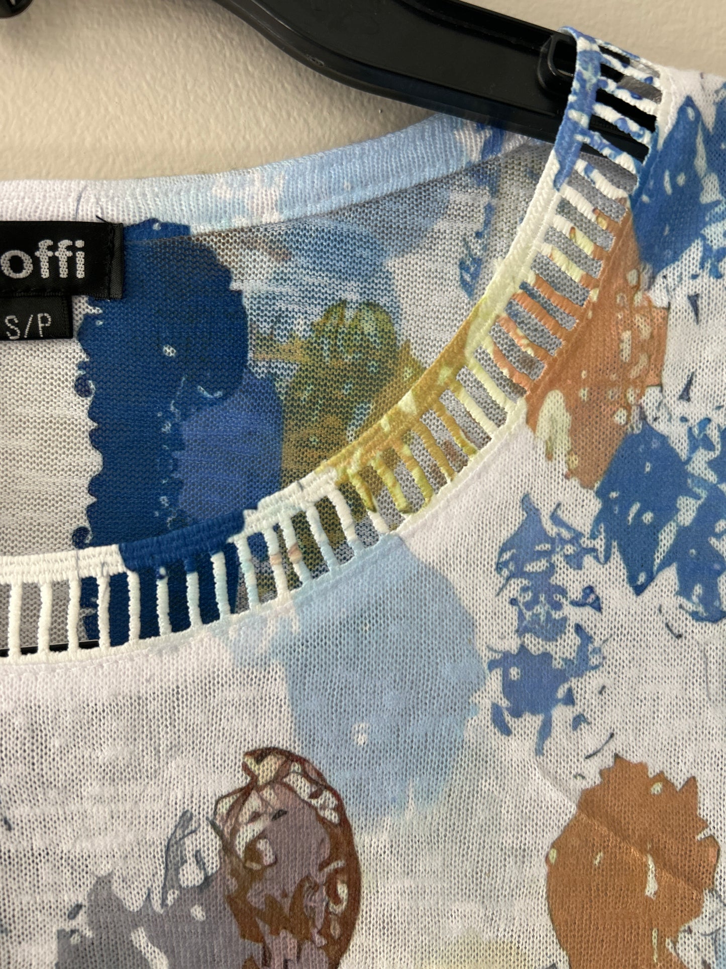 Lightweight short sleeve top with square eyelet neckline trim